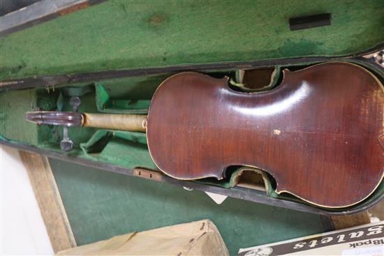 A violin bearing label Ruggeri with two bows and another